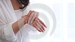 Closeup shot of hands applying moisturizer. Treat yourself. Young lady try moisturizing revitalizing creme lotion. self