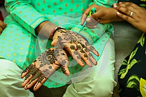 Closeup shot of Heena design on a female hand