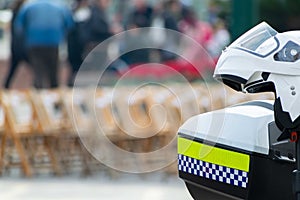 Closeup shot of the helmet of a police officer with a blurry background