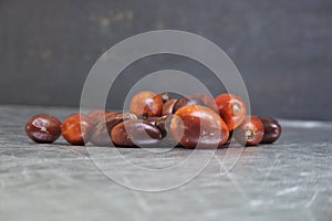 Closeup shot of jujubes bunch on a smooth metal surface