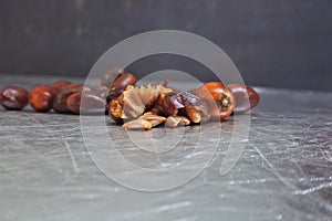 Closeup shot of jujubes bunch on a smooth metal surface