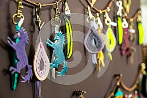 Closeup shot of leather trinkets hanging in a store