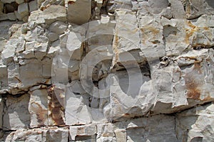 Closeup shot of a limestone wall with cuboidal pattern in Arnager, Bornholm