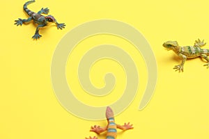 Closeup shot of lizard shaped rubber toy in color background
