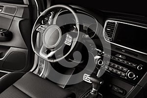 Closeup shot of a luxurious black interior of a modern elegant car