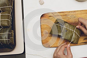 Closeup shot of a making process of Hallaca