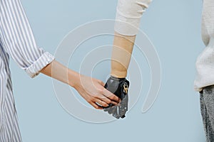 CloseUp Shot Of Man With Artificial limb Holding Hands With Female Partner