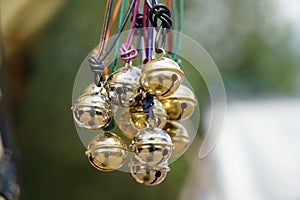 Closeup shot of many hanging sleighbells