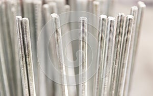 Closeup shot of metal screws bolts for fixing - industrial concept