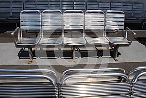 Closeup shot of metallic chairs in a row