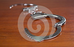 Closeup shot of metallic handcuffs