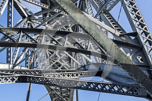 Closeup shot of the metalworks of famous Dom Luis I Bridge in Porto, Portugal photo