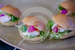 Closeup shot of mini sandwiches being prepared for the buffett