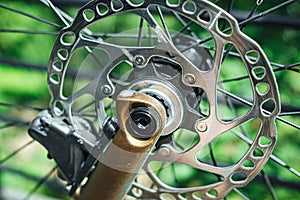 Closeup shot of a modern bicycle hydraulic disc brake