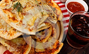 Closeup shot multiple stack hot oven baked tasty delicious Italian homemade ham pineapple traditional Hawaiian bread crust pizzas