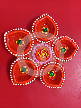 closeup shot of new colorful handmade earthen lamps or panch pradip for decoration in Deepawali festival