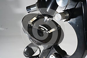 Closeup shot of an old black microscope