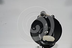 Closeup shot of an old black microscope