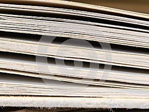 Closeup shot of the pages of a thick book