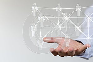 Closeup shot of a person presenting the virtual projection of social network