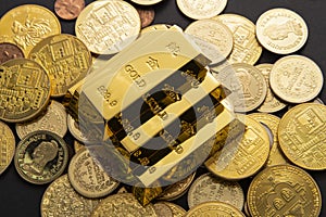 Closeup shot of a pile of shiny gold coins and bars
