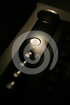 A closeup shot of a power button on a laptop