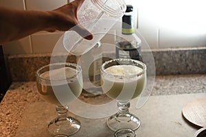 Closeup shot of the preparation of margaritas during a time of quarantine