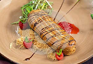 Closeup shot of a raspberry eclair