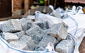 Closeup shot of reclaimed cobbles stones with blur background