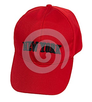 Closeup shot of a red baseball cap with the logo "NEW YORK" isolated on the empty white  background photo