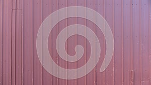 Closeup shot of red corrugated metal sheet texture background