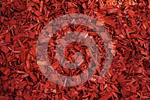A closeup shot of red mulch used for garden decorating