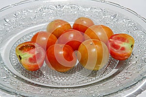 Closeup shot of red, yellow and pulpy tomatoes