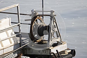 Closeup shot of rusty old boat pulley gear