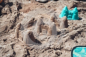 Closeup shot of sandcastles on a beach