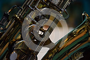 Closeup shot of saxophone details on a blurred background