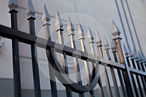 Closeup shot of sharp spikes on a gate