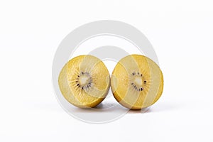 Closeup shot of sliced golden kiwis isolated on white background