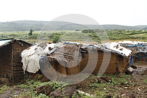 Closeup shot of small huts in a field in Kabala, Africa