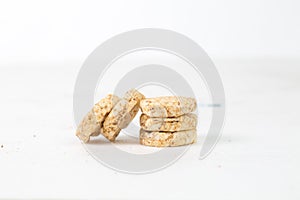 Closeup shot of a stack of pignolia isolated on a white background