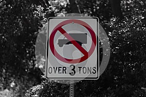 Closeup shot of a street sign forbidding the entry of trucks over 3 tons