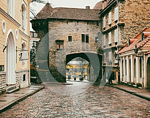 Closeup shot of Tallinn Old Town with cobblestone road and old buildings around