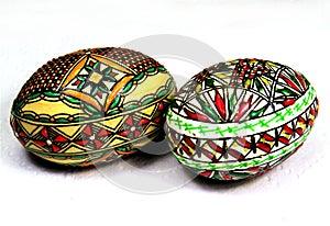 Closeup shot of traditionally decorated Easter eggs in Bucovina, Romania on a white background
