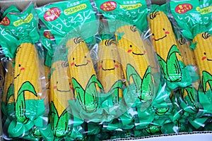 Closeup shot of vacuum packed corn in a funny package in a Japanese supermarket