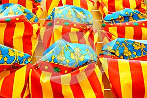Closeup shot of Valencian flags on a street in Valencia, Spain photo