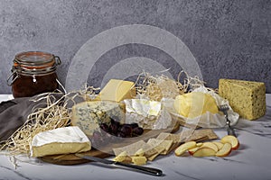 Closeup shot of a variety of cheese and wheat crackers on the table