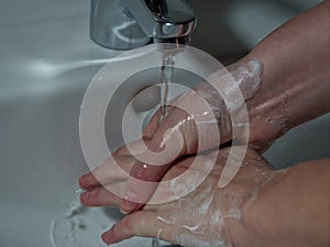 Closeup shot of washing hands with soap, protection virus bacteria flu coronavirus covid-19