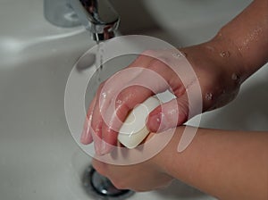 Closeup shot of washing hands with soap, protection virus bacteria flu coronavirus covid-19