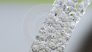 Closeup shot of water with bubbles with blurred background