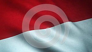 Closeup shot of the waving flag of Monaco with interesting textures